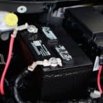 how many volts does a car battery need to start