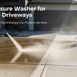 Person using pressure washer on concrete driveway for cleaning and restoration.