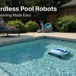 Cordless pool robot cleaning a backyard pool with a person relaxing nearby.