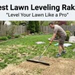 Man using a lawn leveling rake to even out soil in backyard.
