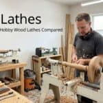 Man using a wood lathe in a workshop for woodworking projects.