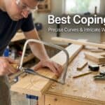 Man using a coping saw for precise woodworking cuts in a workshop.